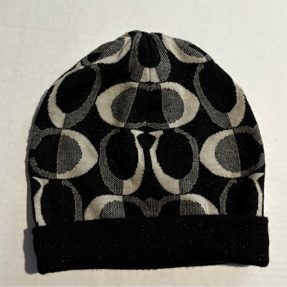 Coach knit hat, black w/ white “C” pattern.Lightweight. Very cute. Great shape